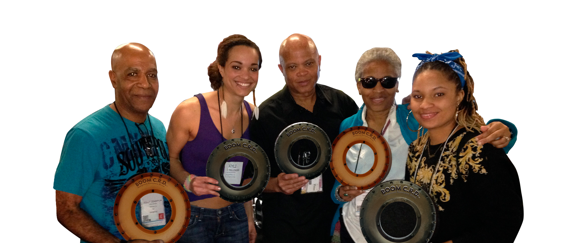 Sam Millender, BOOM CRD Inventor (middle) and Billy Johnson, drummer, (left) along with others holding BOOM CRD Devices